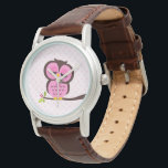 Montre Chouette rose<br><div class="desc">La montre élégante personnalisée présente une illustration vectorielle douce d'un hibou perché sur une branche d'arbre sur un arrière - plan motif pois. Babystar Design à l'adresse mygrafico.com</div>