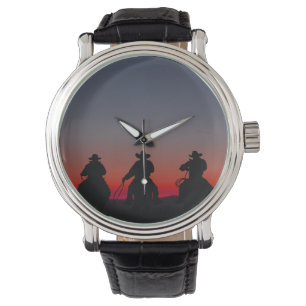 Montre cowboy au coucher du soleil