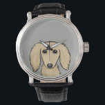 Montre Dachshund à crème à poils longs | Cartoon Wiener D<br><div class="desc">Cette montre à poignet pour chien épluché originale est disponible dans des styles variés pour les hommes, les femmes et les enfants. Un accessoire de mode cool qui fait un grand cadeau pour les amateurs de crème anglaise longue durée Dachshund. Visitez le Doodle World de Jenn pour de nombreuses montres...</div>