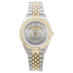 Montre de regard d'or et d'argent de monogramme