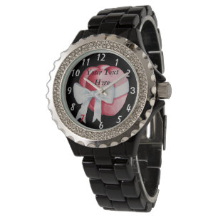 Montre deux coeurs rouges attachés avec l'arc blanc de