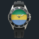 Montre Drapeau gabonais (Gabon)<br><div class="desc">Ce dessin présente le drapeau national du Gabon, un pays de la côte ouest de l'Afrique centrale. Le Gabon est situé sur l'équateur. Le Gabon est bordé par la Guinée équatoriale au nord-ouest, le Cameroun au nord, la République du Congo à l'est et au sud, et le golfe de Guinée...</div>