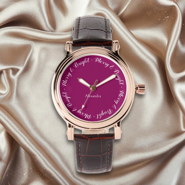 Montre Élégant Joli Design Chic Joyeux Noël (An elegant watch with magenta face and 'Merry & Bright' caption around the edge)