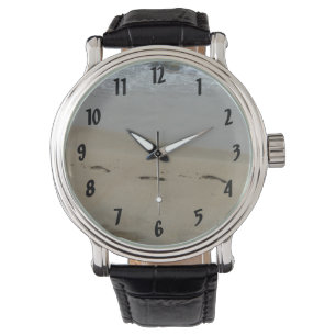 Montre Empreintes dans le sable