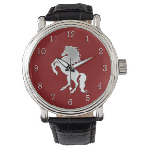 Montre Étalon argenté sur fond rouge
