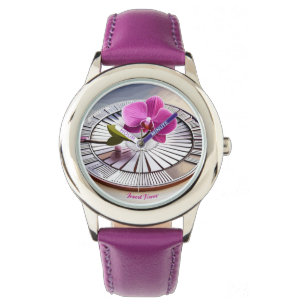 Montre Exquise orchidée rose repose sur une plaque d'arge