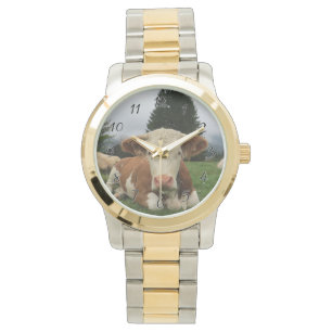 Montre Fermeture d'une vache brune et blanche