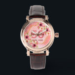 Montre fête du 50e anniversaire corail or dahlia fleurs<br><div class="desc">Une montre branchée pour un cadeau de 50e anniversaire. Avec un faux cadre hexagone en or géométrique. Décoré de fleurs de dahlia aquarellées en rose, crème et corail. Vivre corail avec des pois comme arrière - plan. Modèles pour un nom, 50 ans et une date. Date de naissance ou date...</div>