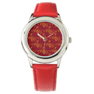 Montre Feuilles de branches de silhouette orange sur roug