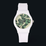 Montre Feuilles et succursales sur Arrière - plan de crèm<br><div class="desc">Des feuilles verts et des branches se reposent sur un arrière - plan crème dans cette impression de Jennifer Goldberger. Au fur et à mesure que la saison change, les couleurs de ces feuilles restent les mêmes, apportant un peu de consistance dans votre vie.</div>