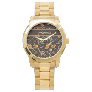 Montre Feuilles et vrilles orange sur motif noir