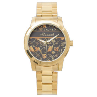 Montre Feuilles et vrilles orange sur motif noir
