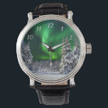 Montre Feux nordiques en hiver<br><div class="desc">aurores boréales aux tons verts avec un arrière - plan d'arbres chargés de neige. 100% Personnalisable. Cliquez sur le bouton PERSONNALISER pour ajouter, déplacer, supprimer, redimensionner ou modifier les polices ou les graphiques.</div>