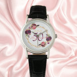 Montre Fleurs d'anniversaire blanc géométrique nom bordea<br><div class="desc">Un cadeau ou un souvenir pour un 50e anniversaire ou n'importe quel âge. Un arrière - plan blanc chic avec un cadre géométrique en faux or. Décoré de fleurs violettes foncées et bordeaux, de plumes roses et boho. Modèles pour un nom, un âge et une date. Date de naissance ou...</div>