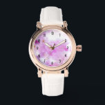 Montre Fleurs de fleurs de cerisier rose<br><div class="desc">Une montre avec une belle photo représentant des fleurs de cerisiers roses. Image rêvée avec lumières bokeh et étincelles.</div>