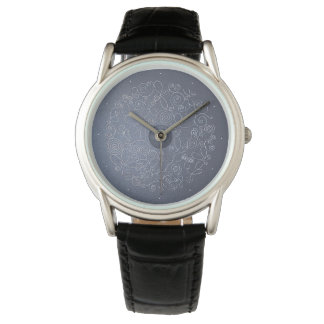 Montre fond grisâtre et ornements en fil d'argent