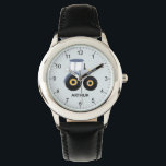 Montre Garçons Cute Blue Farm Tractor Enfants Regarder<br><div class="desc">Cette montre pour enfants mignonne et moderne dispose d'un tracteur agricole bleu et peut être personnalisée avec votre nom de garçon. Avec des chiffres clairs et faciles à lire, cette "première" montre est idéale pour les enfants ou les tout-petits qui commencent à apprendre l'heure. Le design agricole parfait pour votre...</div>
