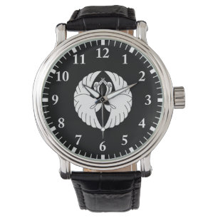Montre Grues blancs face à face