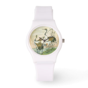 Montre Grues orientales au bord de l'eau