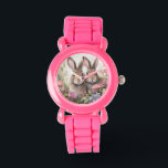 Montre Hares et Fleurs sauvages<br><div class="desc">Découvrez cette montre inspirée de la nature avec deux lièvres et Fleurs sauvages - un magnifique garde-temps conçu spécialement pour les jeunes explorateurs et aventuriers. Cette montre ludique et colorée est non seulement un moyen fiable de garder une trace du temps, mais aussi un compagnon passionnant pour tous leurs voyages...</div>