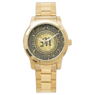 Montre Hiéroglyphes antiques égyptiens d'or de monogram