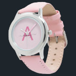 Montre Hot rose moderne Script Girls Monogramme Nom<br><div class="desc">Voici un accessoire intemporel conçu pour ceux qui ont un goût éclairé pour l'élégance. Cette montre monogramme personnalisée, avec le "A" initial rose chaud dans un script moderne, combine sans effort le raffinement avec une pop de couleur ludique. Le bracelet en cuir moelleux offre confort et luxe, tandis que la...</div>