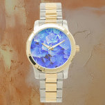 Montre Hydrangea Blues<br><div class="desc">Profitez des jolies fleurs bleues de l'été toute l'année avec cette jolie montre. J'ai vu ces hydrangées bleu azur s'approfondir du début de l'été au milieu de l'été. Leurs bleus étaient un peu timides au début, applaudis de blanc, bleu ciel ou rose et puis soudain j'ai remarqué à quel point...</div>