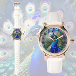 Montre Joli paon avec plumage turquoise et or<br><div class="desc">Cette montre présente un magnifique design paon dans de magnifiques couleurs turquoises,  bleu royal et or. Motif romantique et élégant. Un cadeau parfait et personnalisable pour toute occasion.</div>