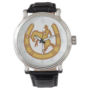 Montre Le panneau avec un cow-boy et des fers à cheval