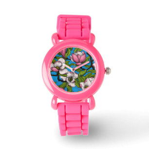 Montre Magnolia en floraison sur bleu