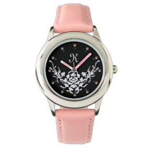 MONTRE MONOGRAMME DE FLEURS ET DE GRIFFES BLANCHES NOIRES
