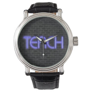 Montre néon brillant TEACH texte sur brique