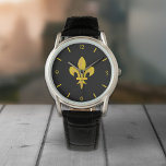 Montre Noire avec Fleur de Lys Or<br><div class="desc">Une montre noire avec une Fleur de Lys couleur or : un cadeau parfait pour un homme élégant !</div>