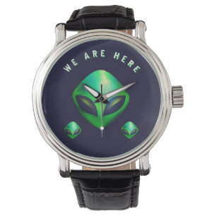 Montre "Nous sommes ici" tête d'alien vert