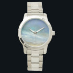 Montre Nuages côtiers<br><div class="desc">Sheila Finch est une artiste fine contemporaine qui aime peindre des images passionnantes du ciel, de la terre et des paysages magnifiques de la Californie. Cette étonnante aquarelle de la côte californienne entourée de nuages a été officiellement autorisée par le World Art Group. Il présente des rayons de lumière époustouflants...</div>