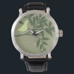 Montre Oiseau vert perché sur une branche verte<br><div class="desc">Comme la couleur verte ? C'est l'impression artistique parfaite pour vous ! Cette belle peinture d'un oiseau jaune-vert sur une branche vert foncé s'adapterait parfaitement à n'importe quel produit Zazzle. L'image de Norman Wyatt est composée de trois nuances de vert. Commandez aujourd'hui !</div>