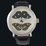 Montre Papillon coloré Medley sur Arrière - plan de crème<br><div class="desc">Une medley papillon très colorée posée sur un arrière - plan crème. Chaque insecte est dessiné avec des détails exquis,  capturant la beauté et l'essence de chaque créature unique. Un grand cadeau pour les papillons amoureux de votre vie!</div>