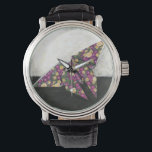Montre Papillon Origami sur papier floral<br><div class="desc">Flottez comme un papillon avec cette belle pièce d'origami de Chariklia Zarris. Un joli papier à imprimer fleuri a été utilisé pour créer le papillon origami,  et les violets,  jaunes et verts sautent simplement de la pièce. Achète ta copie aujourd'hui !</div>