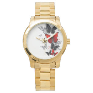 Montre Papillons noirs et rouges volants