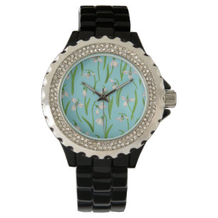 Montre Perce-neige sur fond bleu piscine