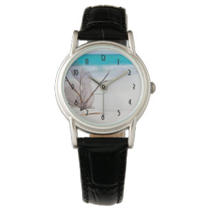 Montre Photographie de Coquillages sur une plage de sable