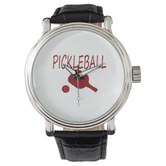 Montre pickleball avec pagaie et boule rouge