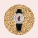 Montre Profil de chat noir<br><div class="desc">Une jolie montre avec un design graphique original Mango Moon Studio. Le visage de la montre présente une silhouette de chat noir élégant contre un arrière - plan rose pâle, créant un contraste délicieux qui ajoute une touche de fantaisie à votre poignet.</div>
