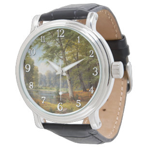 Montre Red Deer par l'étang de la forêt