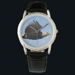 Montre Surveillance du profil de l'aigle à tête blanche<br><div class="desc">Profil d'aigle à chaume volant sur le visage décoratif de montre. Un garde-temps unique apporte une touche de style à la montre analogique classique.</div>