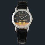 Montre Tante noir rose or arc élégant<br><div class="desc">Élégant, classique, glamour et féminin. Un arc et un ruban de couleur dorée avec parties scintillant et scintillement couleur or rose, un peu de bling et de luxe pour un cadeau d'anniversaire ou de Noël pour votre tante. Arrière - plan noir chic. Avec le texte : La meilleure tante du...</div>