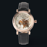 Montre tigres sur neige<br><div class="desc">Maman tigre et enfant marchant sur la neige.</div>
