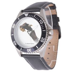 Montre Un aigle à tête blanche monte vers le ciel