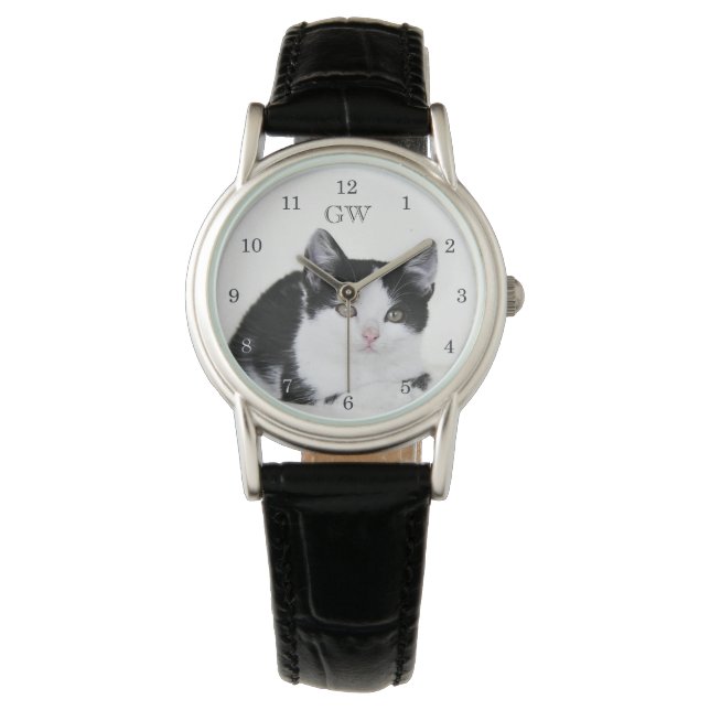 Montres noires et blanches réfléchies (devant)