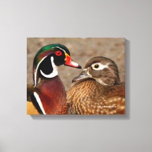 Mooi aanraakmoment tussen houten eenden canvas afdruk